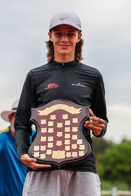 Avery McDermid with the Stuart Hunter Shield for most outstanding under-16 athlete at this year's country championships. Picture by Scott Sidley
