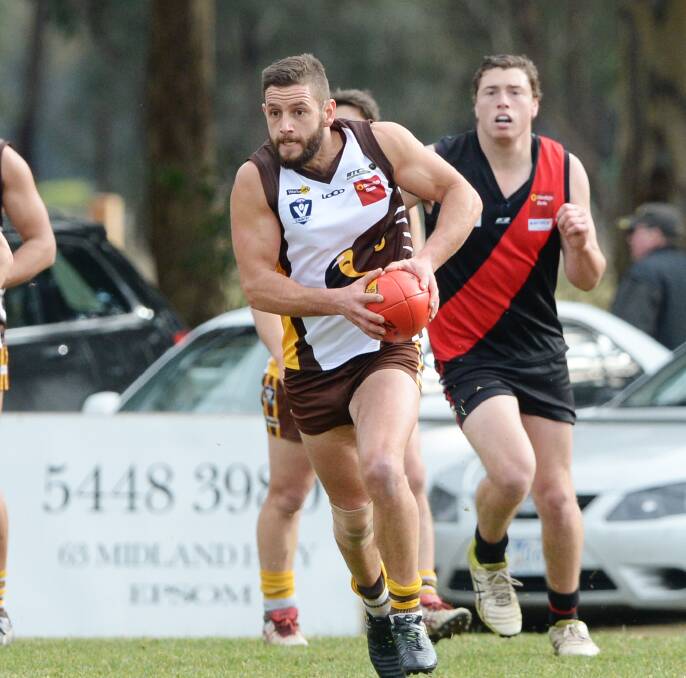 STAR QUALITY: Huntly co-coach Ryan Semmel on the charge against Leitchville-Gunbower. The Hawks lost by 29 points on Saturday. Picture: DARREN HOWE