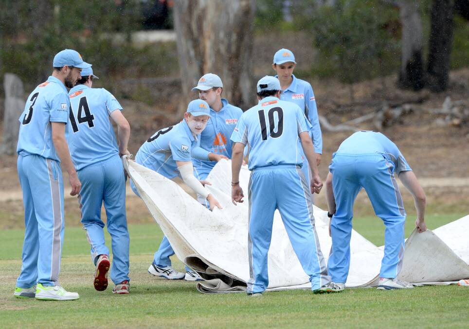 FRUSTRATING: The covers come on at Bell Oval, ending the game between Strathdale-Maristians and Golden Square. Picture: DARREN HOWE