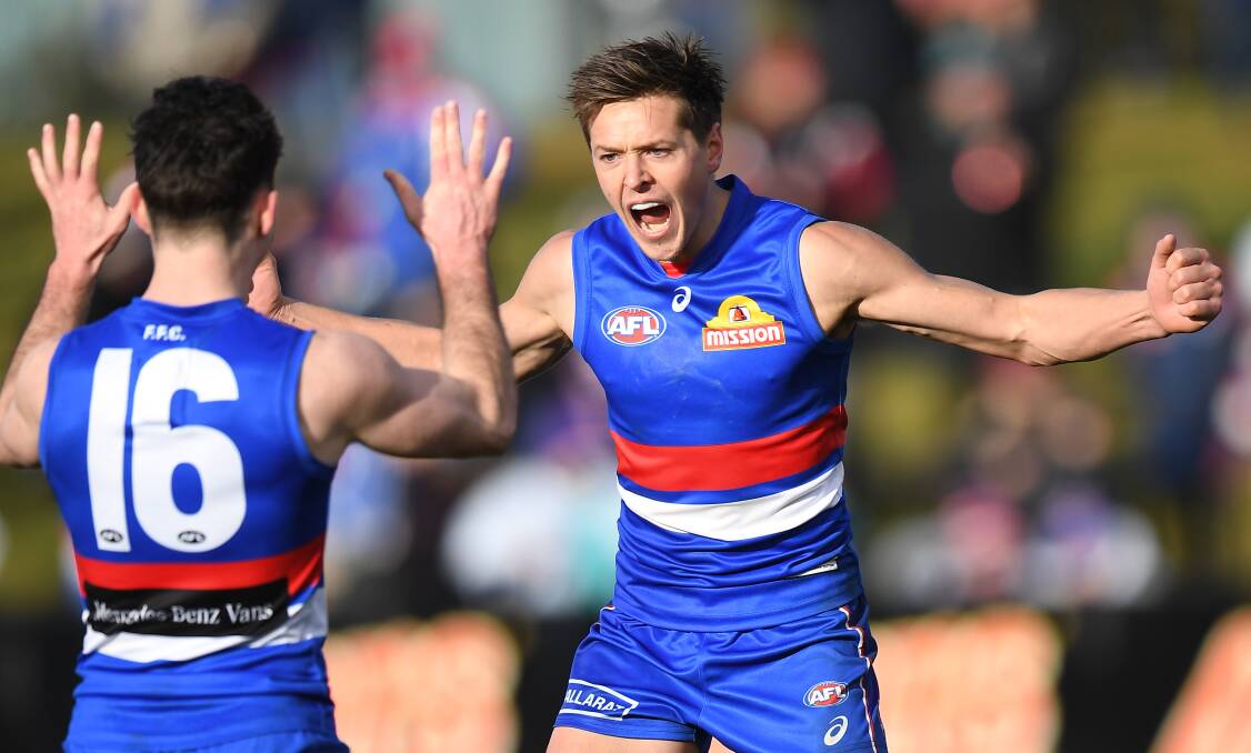 Fergus Greene celebrates his first AFL goal for the Western Bulldogs on Sunday. Picture: FAIRFAX MEDIA