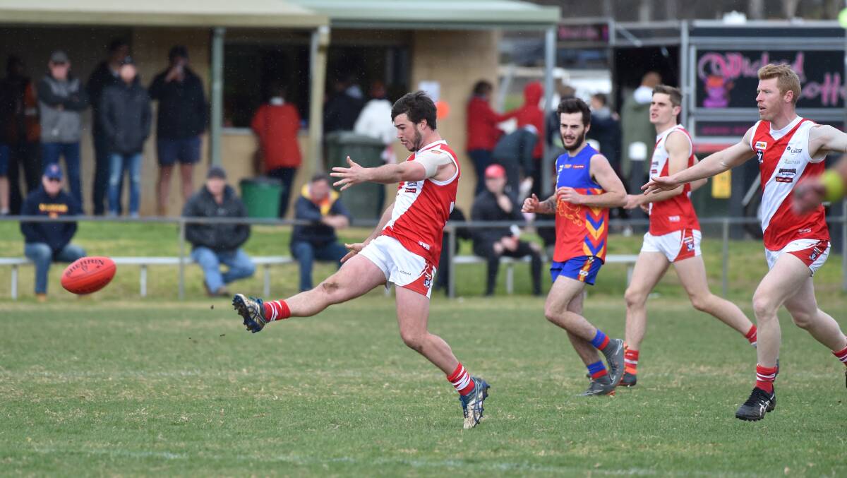 ON THE BOOT: Bridgewater's Kyle Chant gets a kick away for the Mean Machine against Marong in Saturday's final round of the season. Picture: GLENN DANIELS