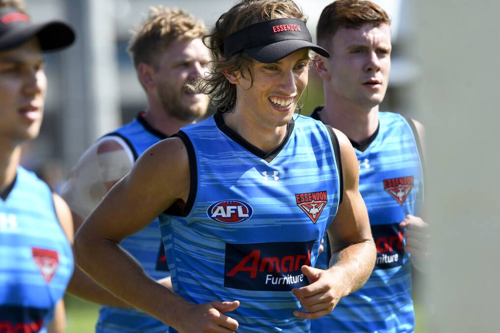Kobe Mutch trains on the QEO with Essendon on Thursday morning. Picture: NONI HYETT