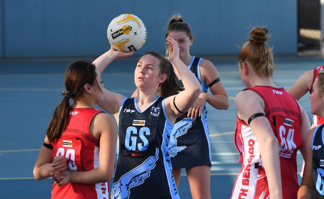 CONCENTRATION: Eaglehawk goal shooter Rylee Gallagher lines up a shot in Saturday's BFNL 17-under match against South Bendigo at Canterbury Park. The Bloods won 47-38. Picture: NONI HYETT