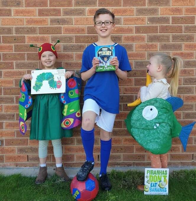 From left, Elise, Henry and Georgia, with their costumes made by mum Sarah for Book Week at home. Photo: supplied. 