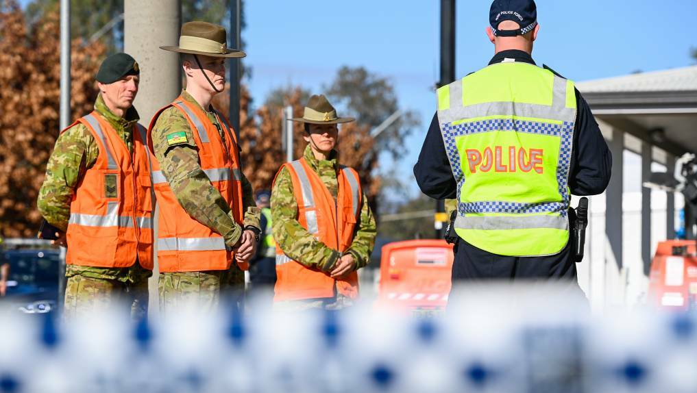 The Australian Defence Force assisting NSW Police at the NSW border closure check point in July. Picture: Mark Jesser