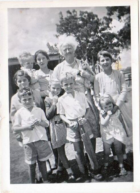 A family favourite, this is a 1958 photo of our blended family all dressed up for Sunday School. Some of his, some of hers, and some of theirs, with Grandma Cecelia Jean holding the cat.