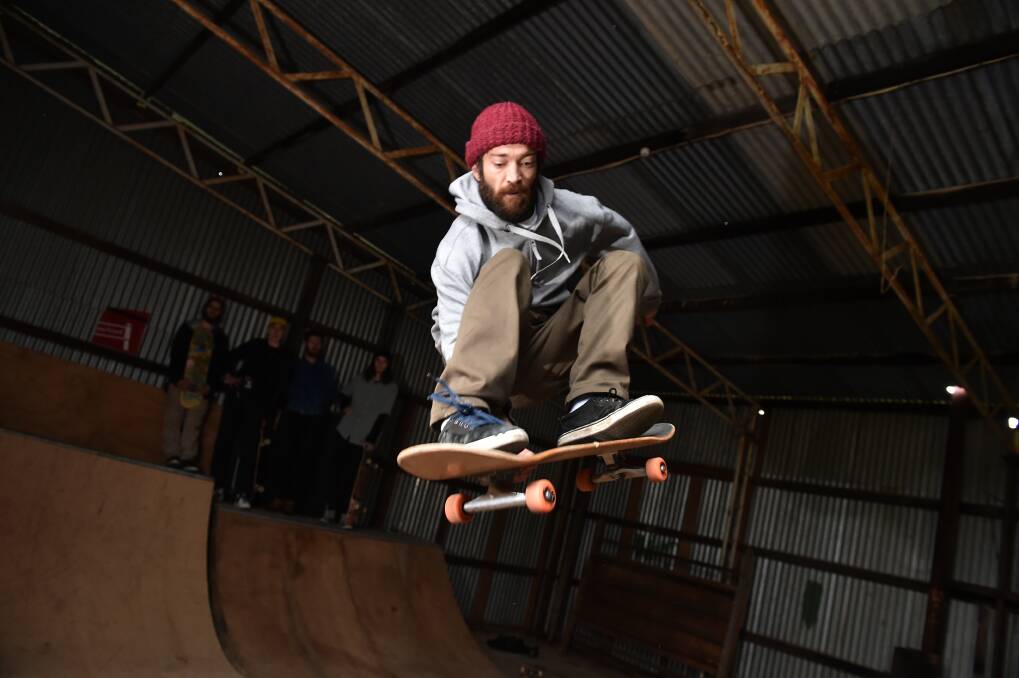 HIGH FLYERS: A group of Bendigo skaters converted an abandoned, government-owned building into an indoor skate park – they have been 'overwhelmed' by public support since being told to dismantle their work. Picture: NONI HYETT