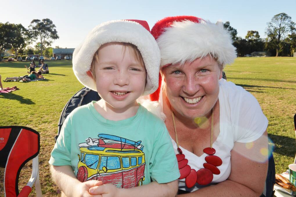 SANTA 1 AND SANTA 2: Ned and Sally Symes. Picture: DARREN HOWE
