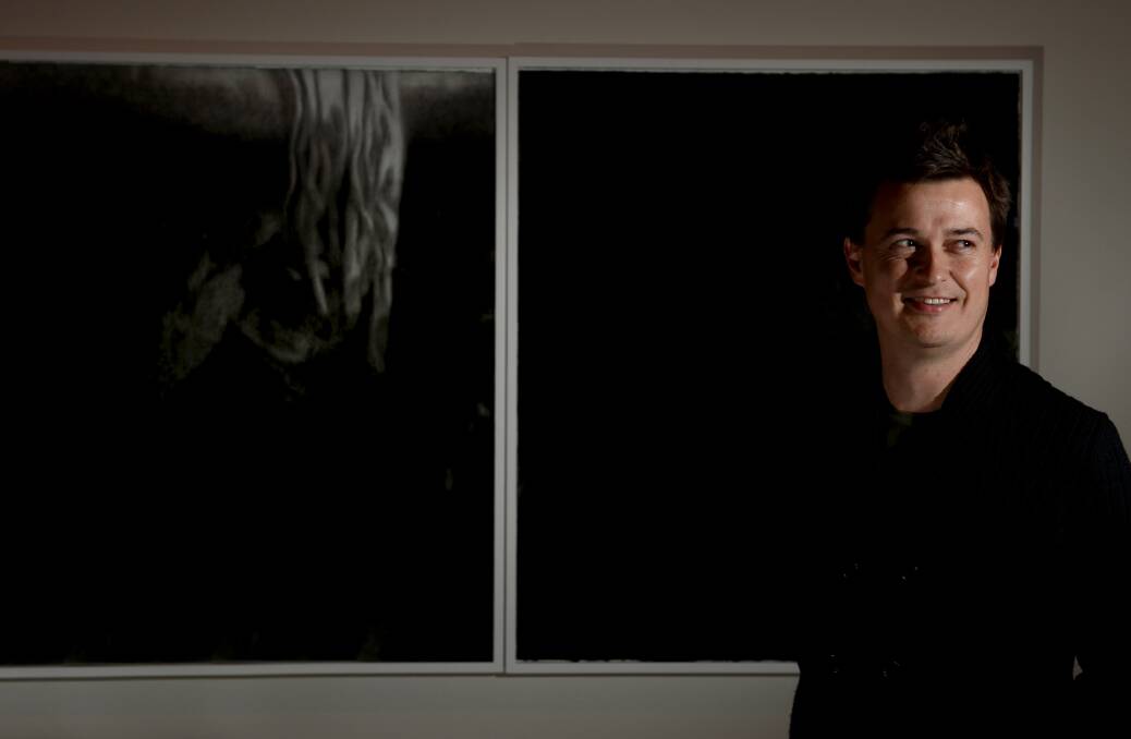 2012 WINNER: Tom Nicholson with his charcoal and white pastel on paper piece 'Drawings and Correspondence 4, 2011'. 