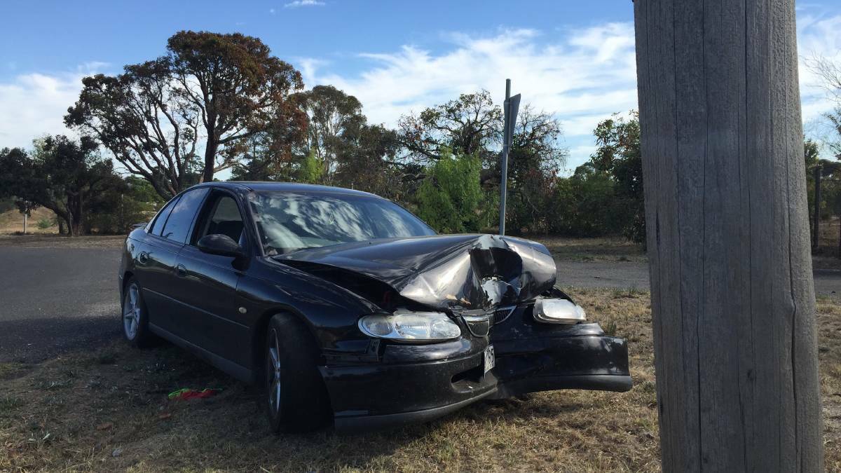 ABANDONED: This car smashed into a pole overnight on Friday and was left abandoned by its owner – the accident occurred on the corner McLachlan Street and Alder Street. Picture: JOSEPH HINCHLIFFE

