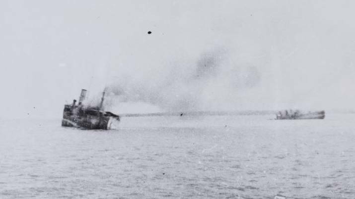 RAPIDLY DRIFTING ON AN OUTGOING TIDE: USS Peary drifting helplessly after the attack. Picture: NT Government.