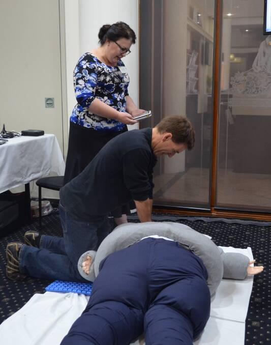Practising resuscitation on an obese-sized dummy. Picture: SUPPLIED