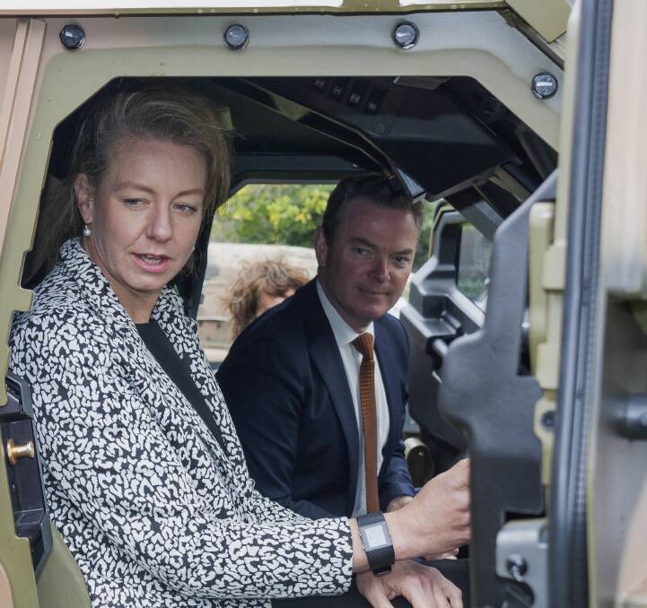IMPRESSED: Victorian senator Bridget McKenzie and federal Minister for Defence Industry Christopher Pyne inspect one of the completed Hawkei pilot vehicles.