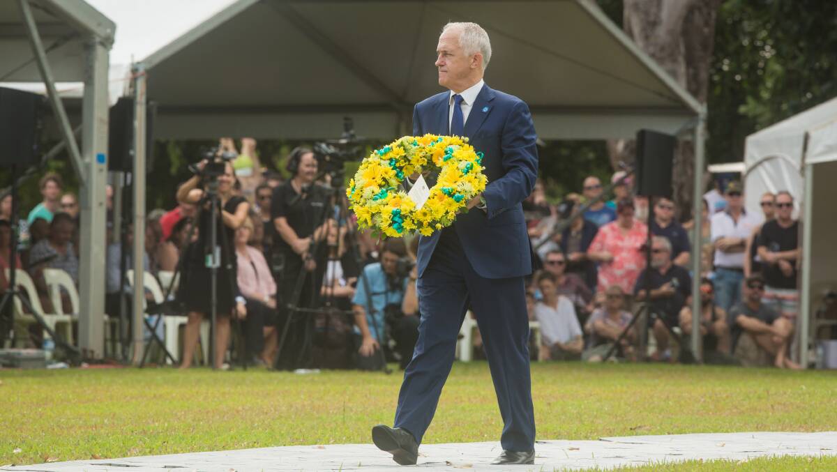 ETIQUETTE: Colin Simmons takes issue with Malcolm Turnbull's hand gestures during the Darwin bombing anniversary ceremony. Picture: SUPPLIED/CITY OF DARWIN