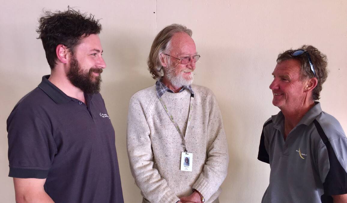 HELPING HAND: BCHS counsellors Dale Pymer (left) and Patrick Cox (centre) discuss the Bendigo Unemployed Older Men's Group with Neil Gemmil (right).