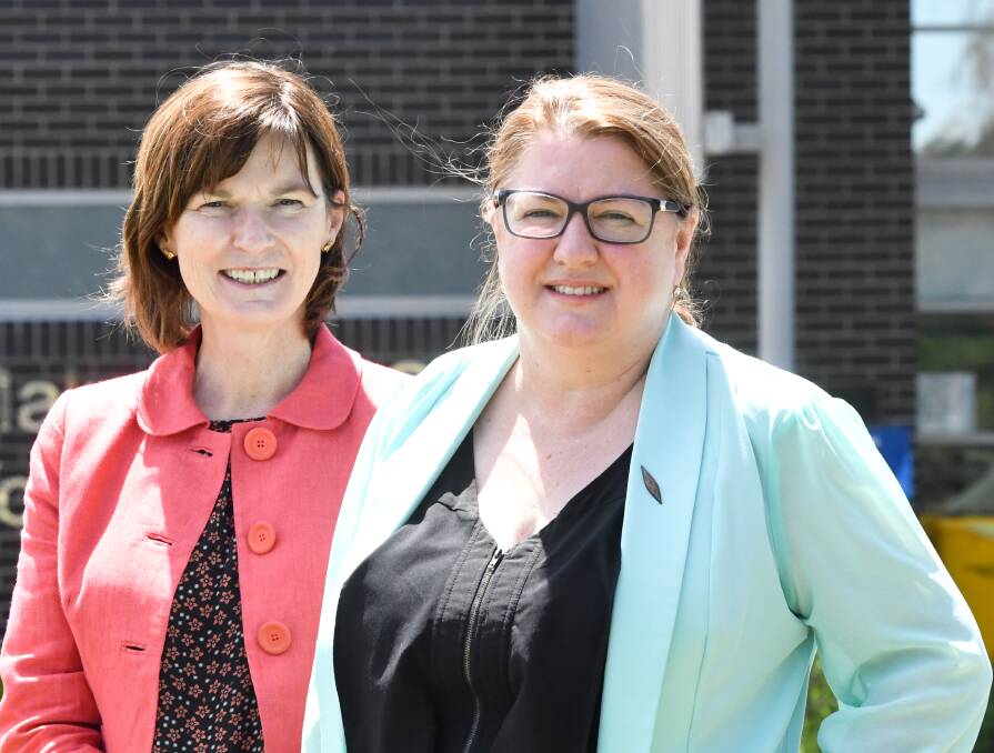 Mary-Anne Thomas (left) with corrections minister Natalie Hutchins. Picture: NONI HYETT