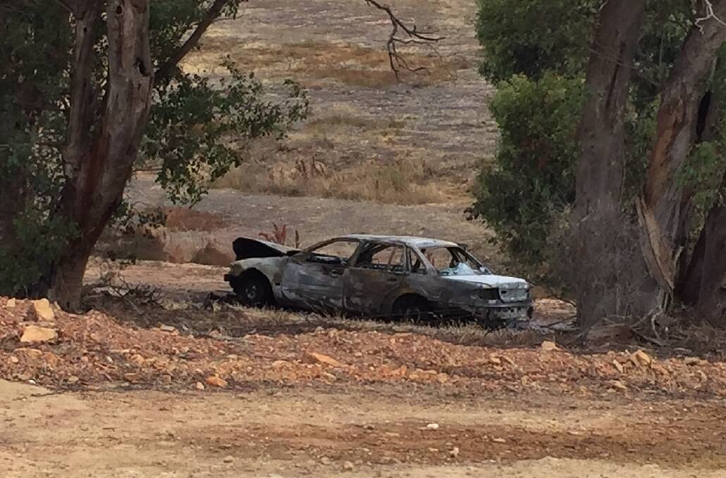 The car was found on land close to several trees off Albert Street in Maiden Gully. Picture: TOM O'CALLAGHAN