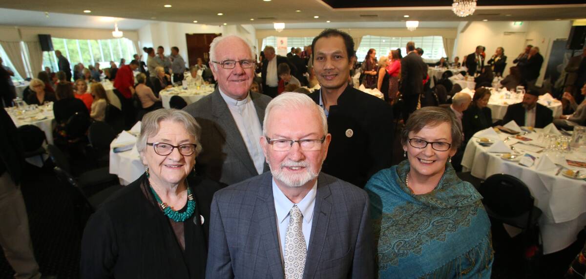 PRAISE: Professor Desmond Cahill (front) with Interfaith Council members Judy Causon, Frank Marriott, Heri Febriyanto and Heather Mertens. 