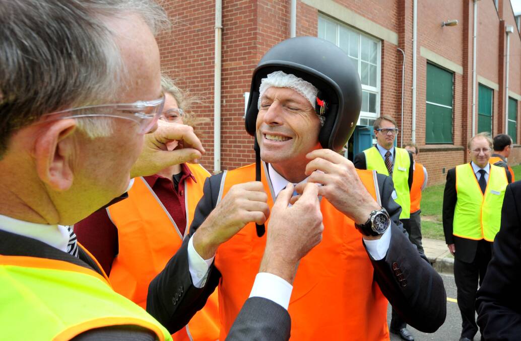 Then opposition leader and future prime minister Tony Abbot visits Bendigo's Thales factory in 2012.