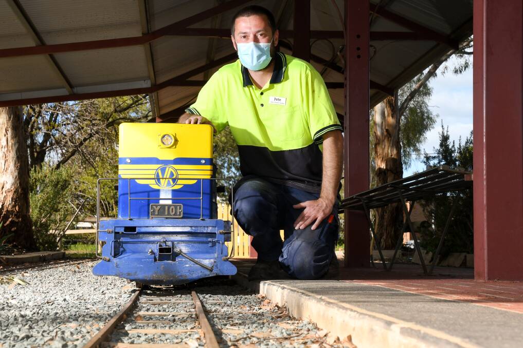 SLOW TRAIN: Elmore Miniature Railway owner Peter Willsher remains upbeat about the continued wait to get back to work. 'If waiting is the safe thing to do, that's what we will do', he says. Picture: NONI HYETT