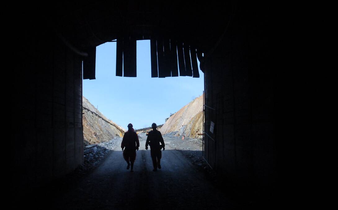 Miners at the entrance to the Swan Decline, an 18km-long tunnel from Kangaroo Flat into Bendigo's underground goldfields. Picture: LAURA SCOTT