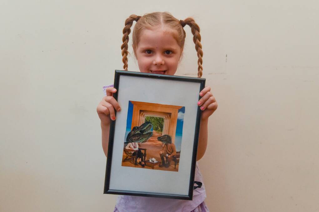 Josie White shows off one of her family's creations ahead of the Scars of Beauty exhibition. Picture by Darren Howe.