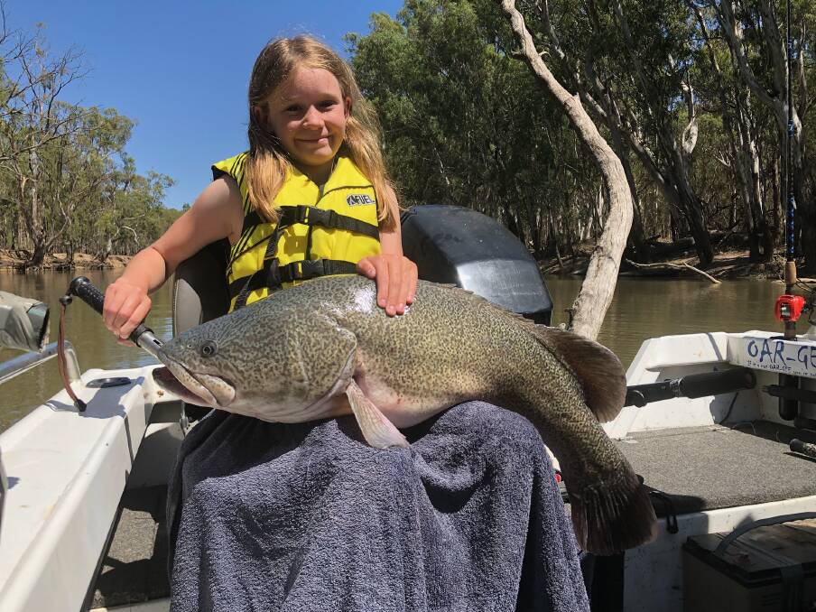 11-year-old Abbey Read with a rare 91cm Murray cod she caught and released last weekend near Echuca. Picture: SUPPLIED