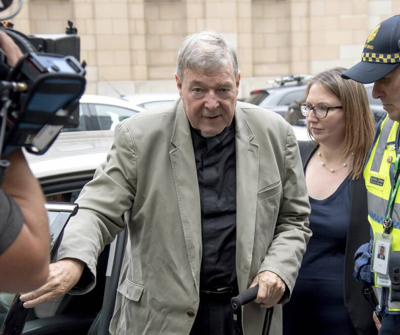TO BE SENTENCED TODAY: Cardinal George Pell arriving at the county court late last Feburary. Picture: AP Photo/Andy Brownbill