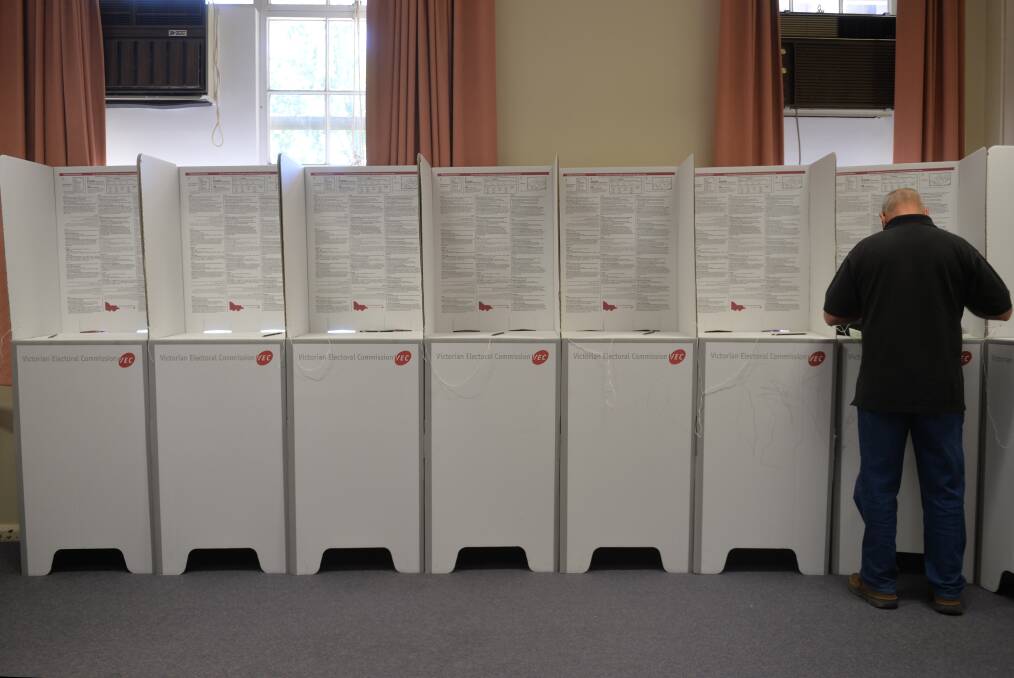 A voter at the 2014 Victorian state election. Picture: BRENDAN McCARTHY