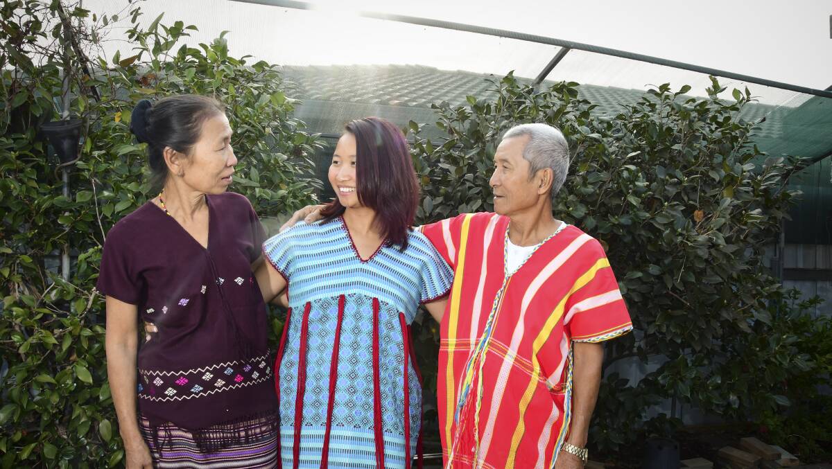 Ah Pit Mue, Sei Sei Mu and her dad Maung Tint. Picture: NONI HYETT