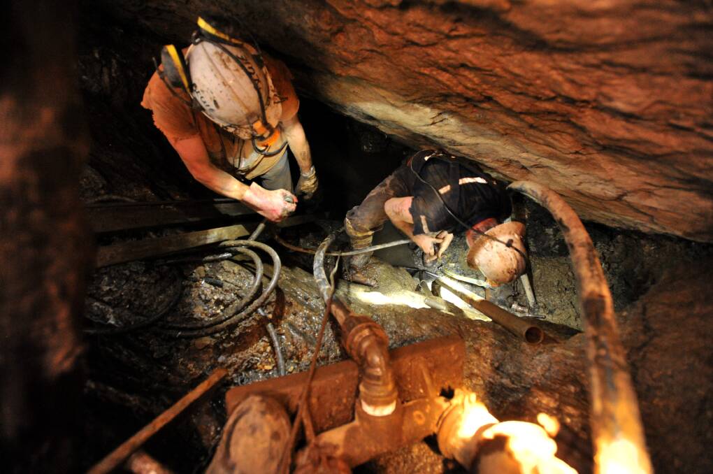 Miners dig in the mine in 2012 during the search for clues in Terry Floyd's disappearance. Picture: PETER WEAVING