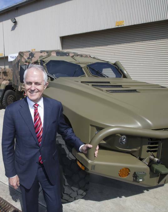 Prime Minister Malcolm Turnbull with a Hawkei in 2015.