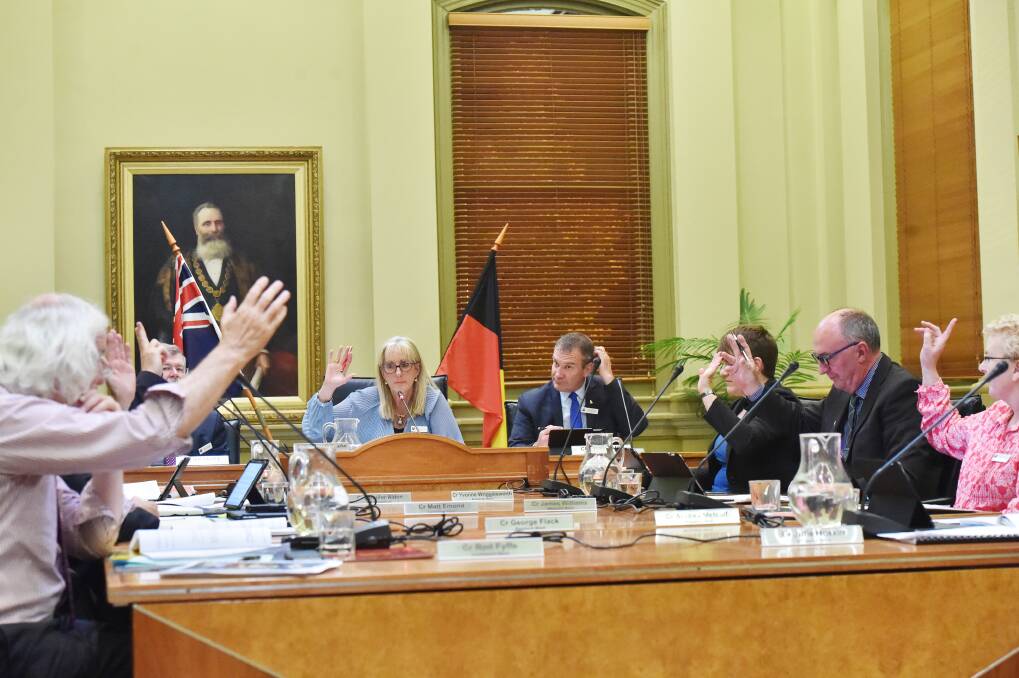 DEBATE: Councillors voting on a decision in Town Hall's council chambers before the pandemic began. Picture: DARREN HOWE