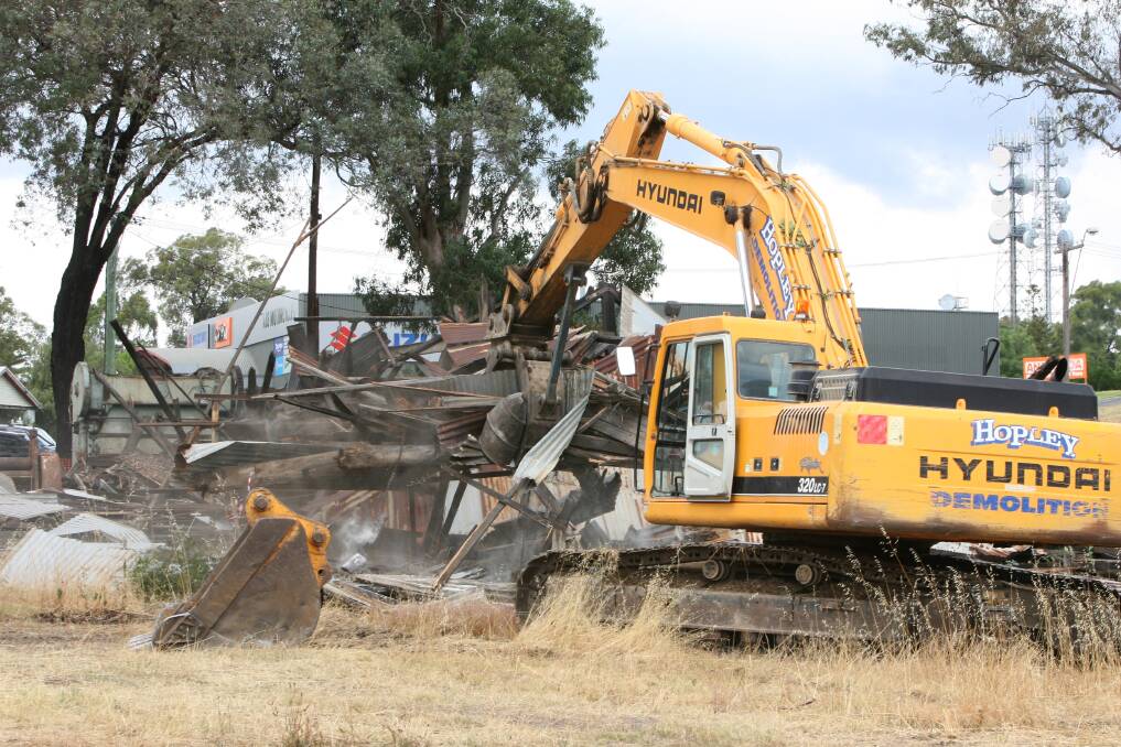 Workers demolishing an Ironbark foundry in 2012. Picture: PETER WEAVING