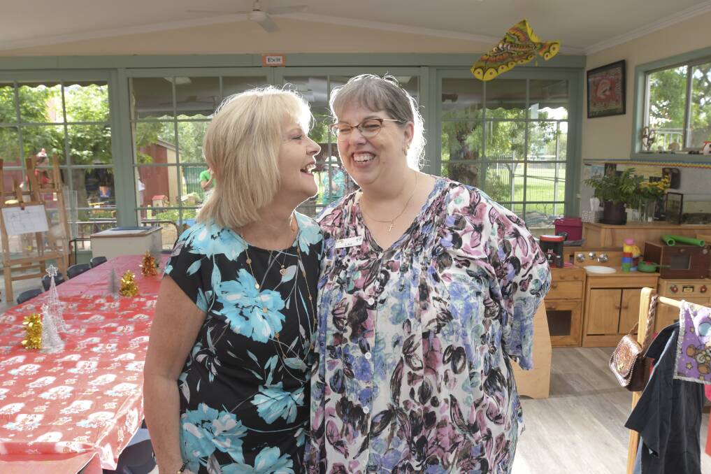 BEST FRIENDS: Janene Reidy and Lisa Claxton celebrate as their workplace clocks up 70 years of operation. Picture: NONI HYETT
