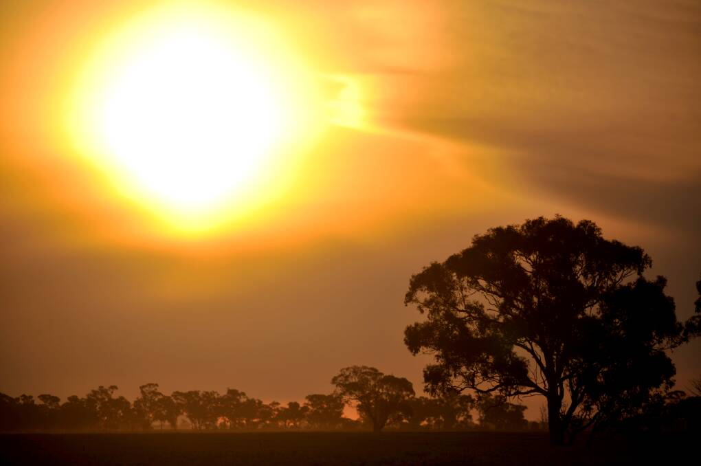 A hot sun sets over central Victoria. Picture: ALEX ELLINGHOUSEN