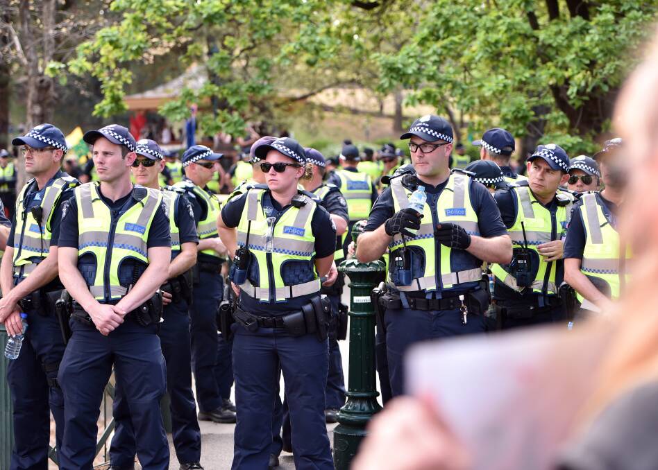 A thick buffer of police separate protesters and counter-protesters during a rally in Rosalind Park over a Bendigo mosque in 2015. Picture: GLENN DANIELS