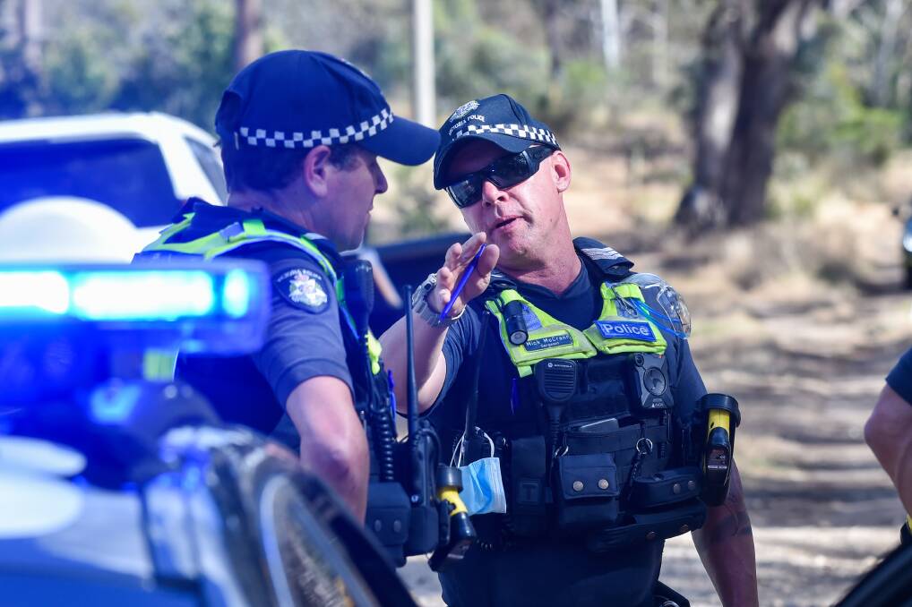 Bendigo police officers at a job. Picture: DARREN HOWE