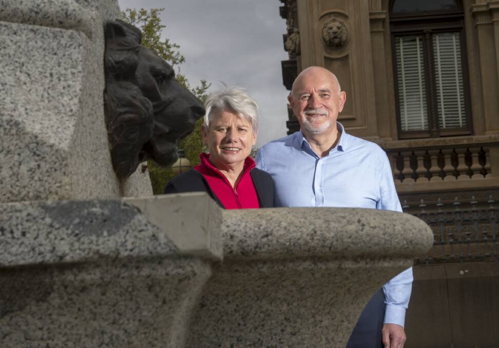 Jill Hanlon and Peter Hargreaves at the Vahland Drinking Fountain, which the prolific 19th century architect designed and which now stands in central Bendigo. Picture: DARREN HOWE