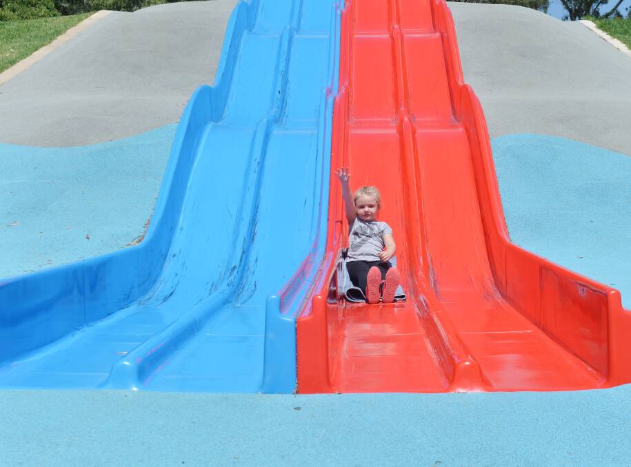 GOOD FUN: Scarlotte Riley enjoys another go on the slide at Cooinda Park in Golden Square. Picture: DARREN HOWE