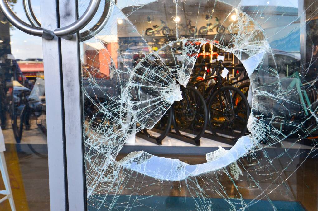 A broken glass door at Giant Bendigo. Picture: DARREN HOWE