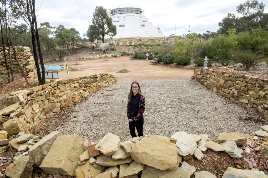 GRAND PLANS: The Great Stupa's Alyce Crosbie at the site of the new Hindu temple that could soon be built in the peace park. Picture: DARREN HOWE