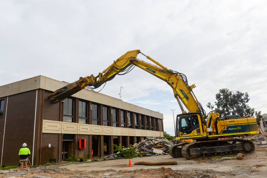 Workers demolished the old City of Greater Bendigo office building in 2020, before the archaeological discoveries. Picture: DARREN HOWE