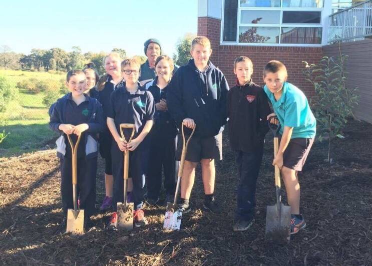 Students had taken ownership of the trees after helping plant and care for them. Picture: SUPPLIED