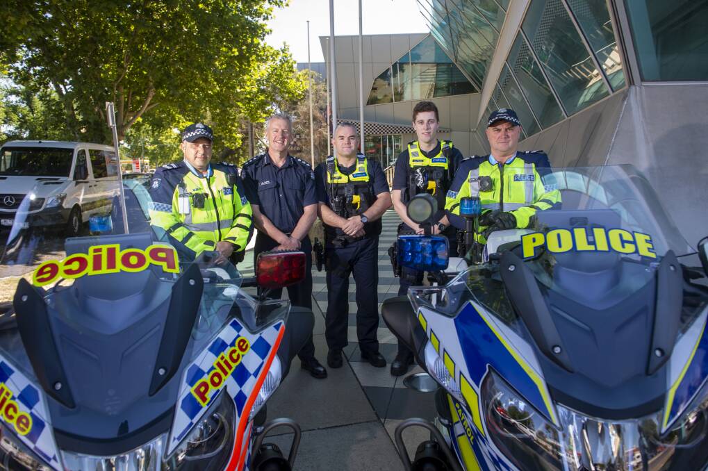 FORCE FOR GOOD: Joel Smith and Jordan Norris (third and fourth from left) will work alongside the community and fellow officers like Bruce Slimmon, Len Ladner and Brendan Keagan. Picture: DARREN HOWE