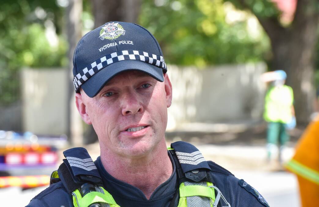 Sergeant Mick McCrann delivers a warning for motorists after a crash. Picture is a file photo.
