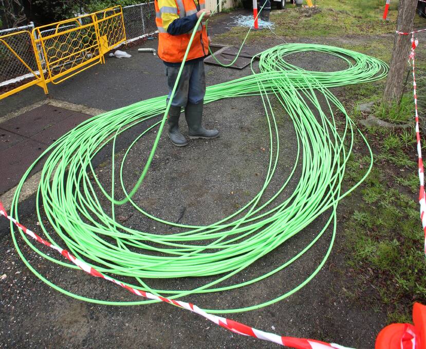 A worker in Bendigo prepares to install cables during the NBN rollout last decade.