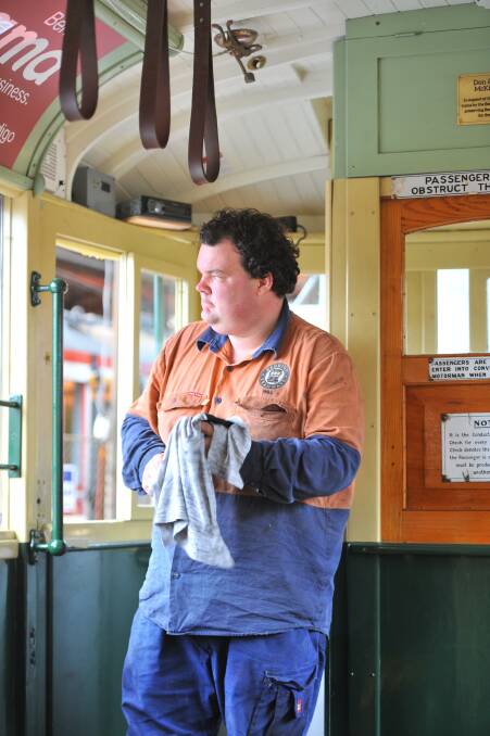 William Adams finishes a brake adjustment service on a 1915 tram at the Bendigo depot. Picture: TOM O'CALLAGHAN