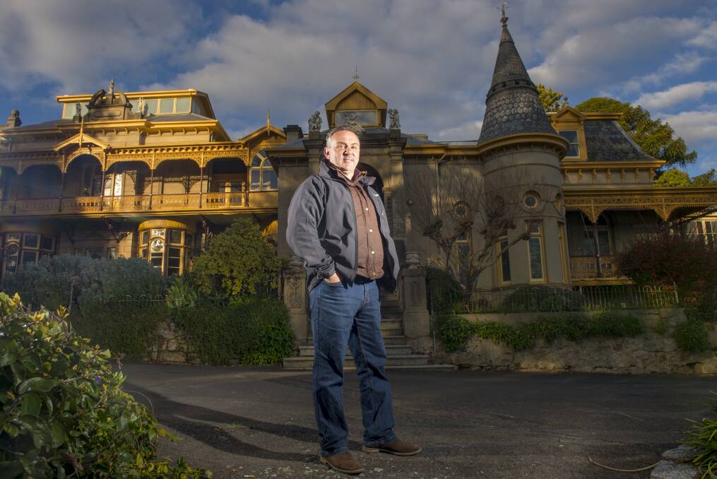 HISTORY ON SHOW: Current owner Paul Banks with Fortuna Villa, the sprawling mansion once owned by one of fortune's favoured sons George Lansell. Picture: DARREN HOWE