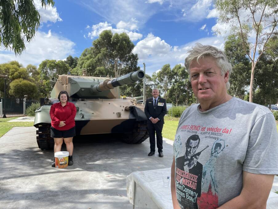 Former troop sergeant with Bunning Epsom's Georgia Nilon and the Bendigo RSL's Peter Swandale after the first coat of paint was applied on Friday. Picture: TOM O'CALLAGHAN